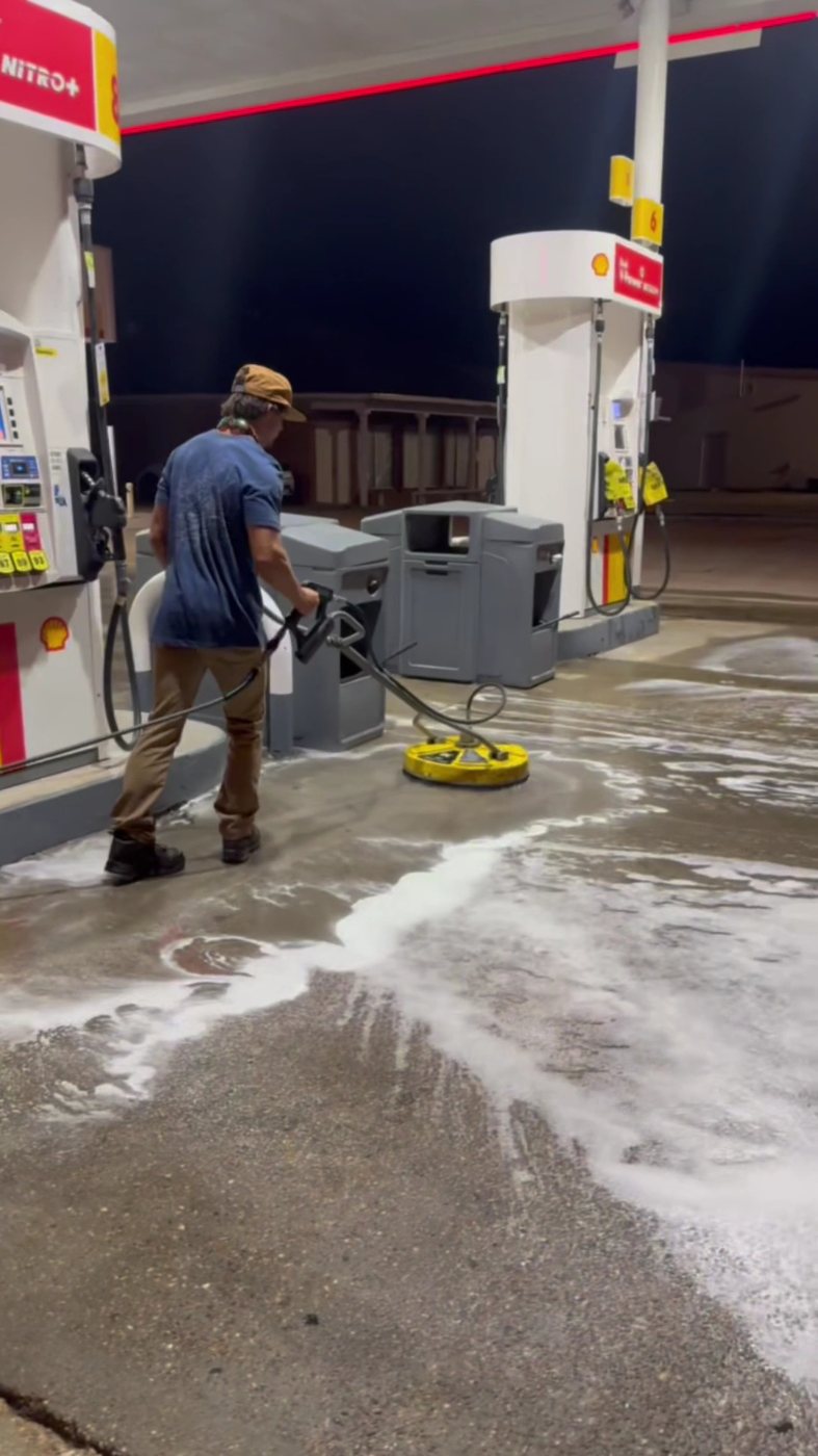 Surface cleaning a fuel station pad